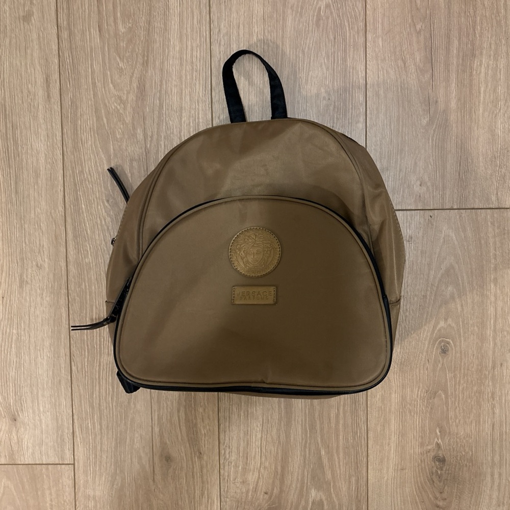 Brown Backpack with Durable Fabric and Dome Shape